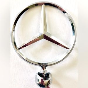 Genuine Mercedes Benz chrome Swivel front hood emblem/star for 1986 300E 13A